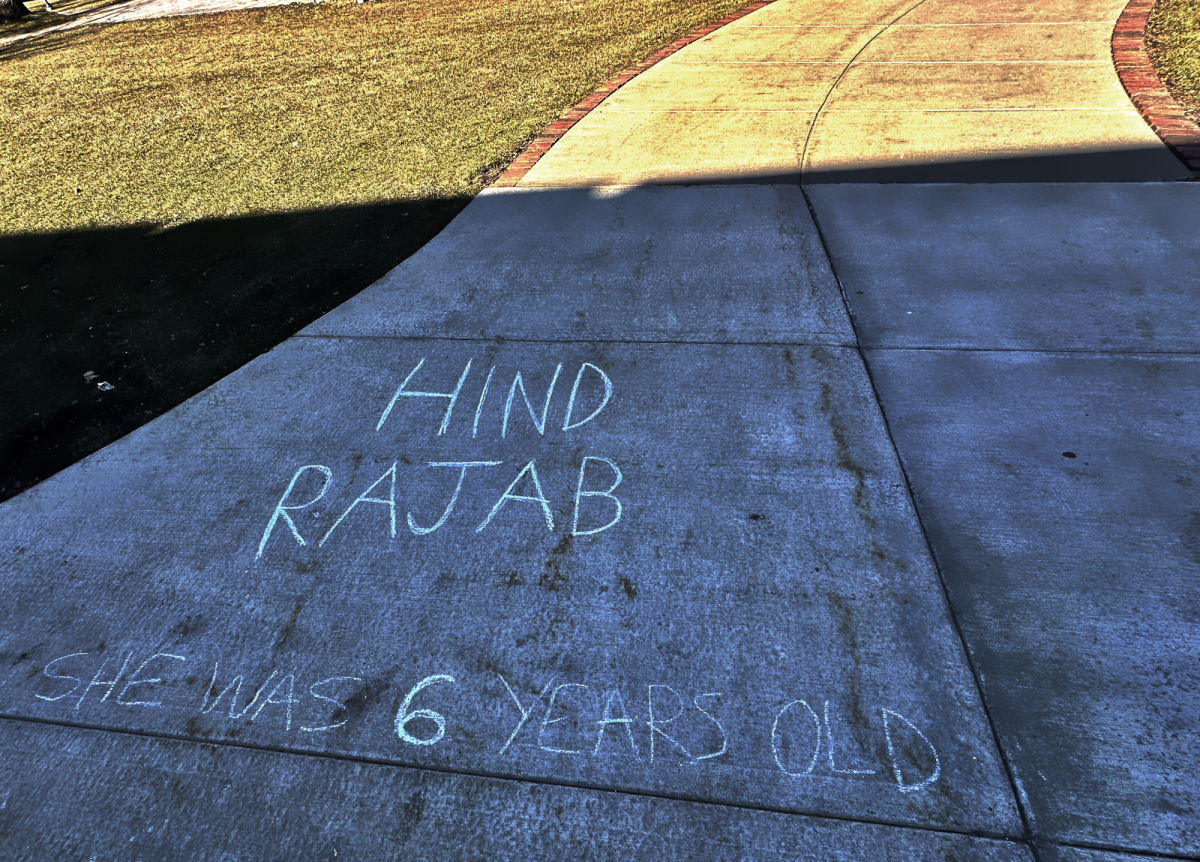 Chalk writing outside Seymour Union that reads Hind Rajab She was 6 years old.