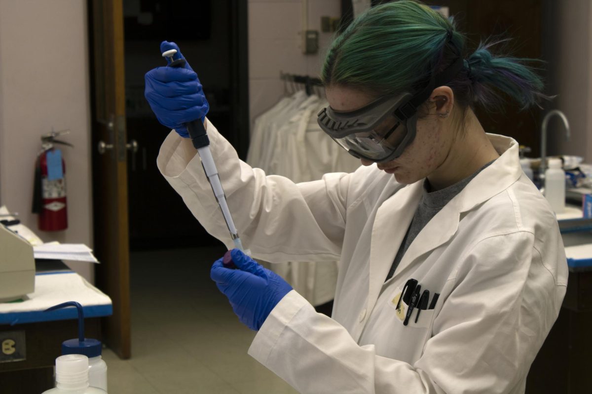 Hannah Terry working in a Chemistry Research Lab