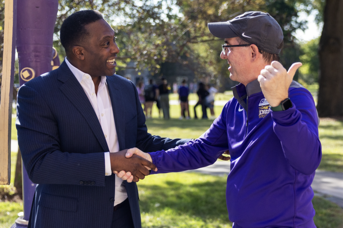President McGadney (left) and Provost Schneider (right) shaking hands at Pump Handle 2024
Photo by Knox Courtesy